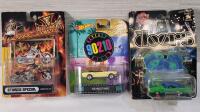 Three (3) Pop Culture Diecast Model Cars / Motorcycle . Beverly Hills 90210 , The Doors & Jesse James . The Doors card back has bend