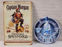 New - Captain Morgan Original Spiced Gold Rum & Grey Goose Vodka Tin Signs . Measures 8"&times;11 &frac34;" & 7 &frac34;" diameter