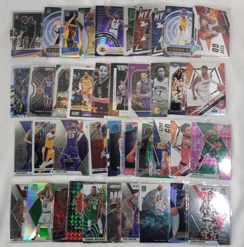 2019 - 21 NBA Basketball Trading Card Singles , 40 Trading Cards .
