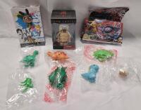 New - Kids Toys and Game Lot . Artsy Famly Card Game , Disney John Carter Vinyl Figure , Bey-Blade Style Toy & Small Rubber Dinosaurs