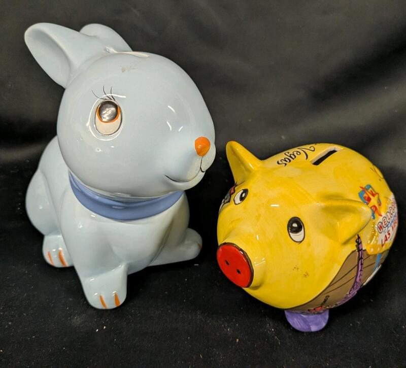 2 Porcelain Coin banks. Tallest Measures 6.5" Tall No chips, cracks or crazing noted.