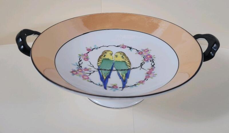 Vintage Noritake Lusterware Handled Bowl featuring a Hand-Painted Parakeet and Floral Design. Measures 2 &frac34;" tall & 8.5" diameter