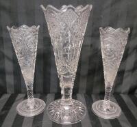 Vintage Pressed Glass Trumpet Vases with Diamond Cut Design Style Motifs . Measures 10" & 12" tall .