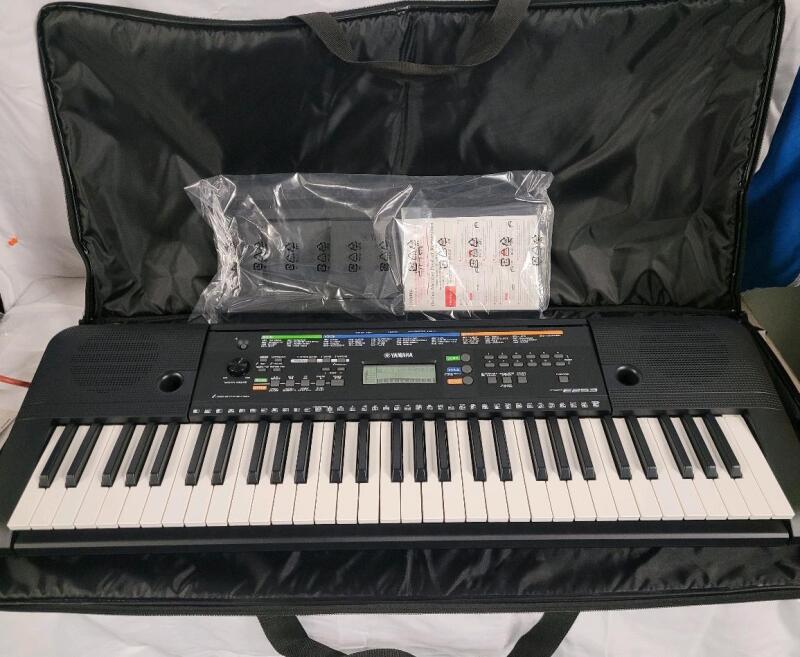 As New - Yamaha PSR-E253 61-Key Portable Keyboard w/Softshell Case . 385 high-quality Voices including pianos, guitars, drums and orchestral instruments<br/>Nine-step lesson function . Tested Working . Retail $199 .