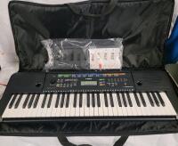 As New - Yamaha PSR-E253 61-Key Portable Keyboard w/Softshell Case . 385 high-quality Voices including pianos, guitars, drums and orchestral instruments<br/>Nine-step lesson function . Tested Working . Retail $199 .