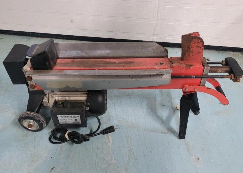 As Is - 4-Ton Electric Log Splitter . Max Diameter 10" , Max Length 20.5" , 2HP 120V 15A . Powers Up - Hydraulic Control Lever Won't Move . Not tested with Wood log