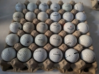 60.gently Used Golfballs.