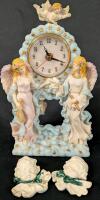 Angel clock with 2 Ceramic Cherub Heads. Clock measure 10.5" Tall.