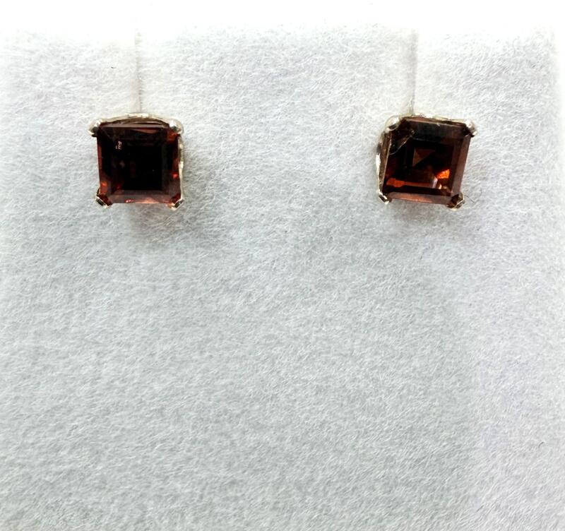10KT White Gold Natural Garnet (0.86ct) Stud Earrings, Retail $400.00. Garnet is the birthstone for January. Made in Canada.