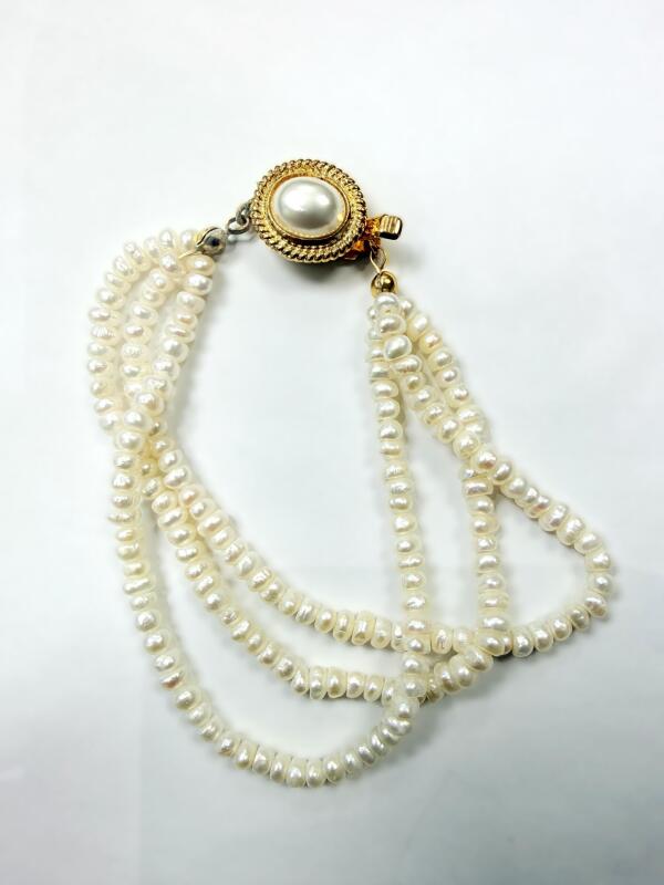 Freshwater Pearl Three Strand Bracelet, Retail $150.00.