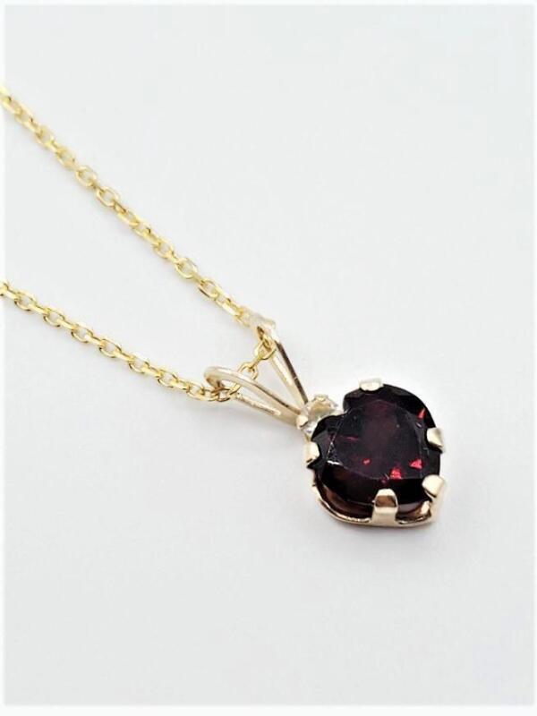 10KT Yellow Gold Natural Garnet (0.93ct) and White Topaz Heart Shape Pendant with Gold Plated Sterling Silver Chain, W/A $650.00.