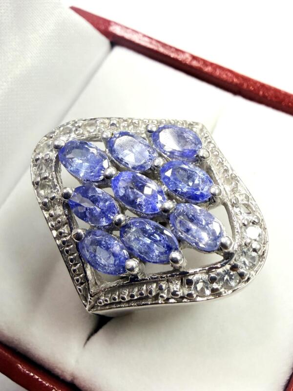 Sterling Silver Natural Tanzanite with White Topaz Ring, Size 9, Retail $700.00. Tanzanite is the birthstone for December.