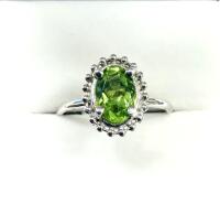 10KT White Gold Natural Peridot (0.75ct) Ring, Size 6.25, W/A $1200.00. Peridot is the birthstone for August.