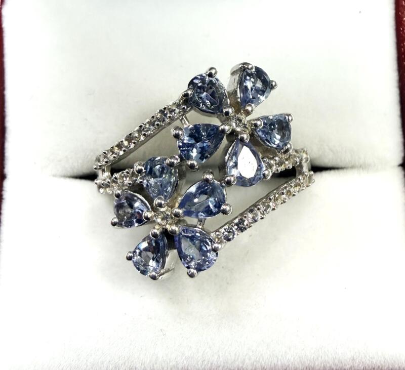 Sterling Silver Natural Tanzanite (1.13ct) with CZ Ring, Size 8.25, W/A $750.00. Tanzanite is the birthstone for December.