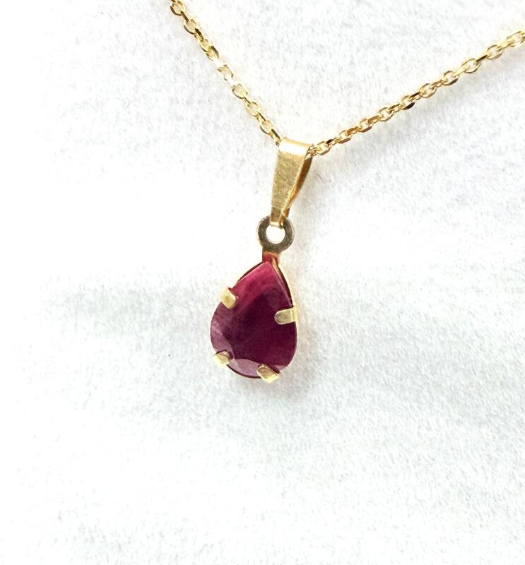 14KT Yellow Gold Natural Enhanced Ruby Pear Shape Pendant with Gold Plated Sterling Silver Chain, Retail $500.00. Ruby is the birthstone for July.