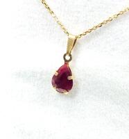 14KT Yellow Gold Natural Enhanced Ruby Pear Shape Pendant with Gold Plated Sterling Silver Chain, Retail $500.00. Ruby is the birthstone for July.