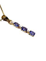 Gold Plated Sterling Silver Natural Tanzanite (0.54ct) Pendant with Gold Plated Sterling Silver Chain, W/A $490.00. Tanzanite is the birthstone for December.