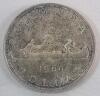 1960 Canadian Silver One Dollar Coin .