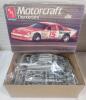 Two (2) 1/25 Scale Race Car Model Kits . One (1) Unstarted - Sealed & One (1) Started - 2