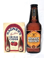 Vintage Style Tin Magner's Sparkling Irish Cider & J W Dundee's Honey Brown Lager Bar signs.