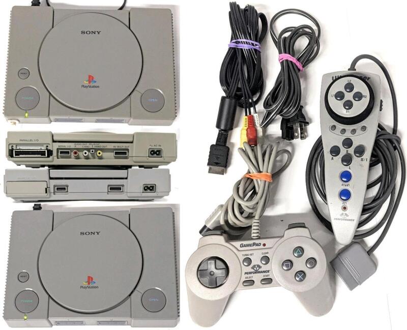 [WOW!] 2 Vintage Sony PLAYSTATION (SCPH-1001 & 7001) Game Systems, 1 Power Cable, 1 A/V Cable For the 7001, Performance Game Pad & UltraRacer Controller, Systems Tested For Power Only