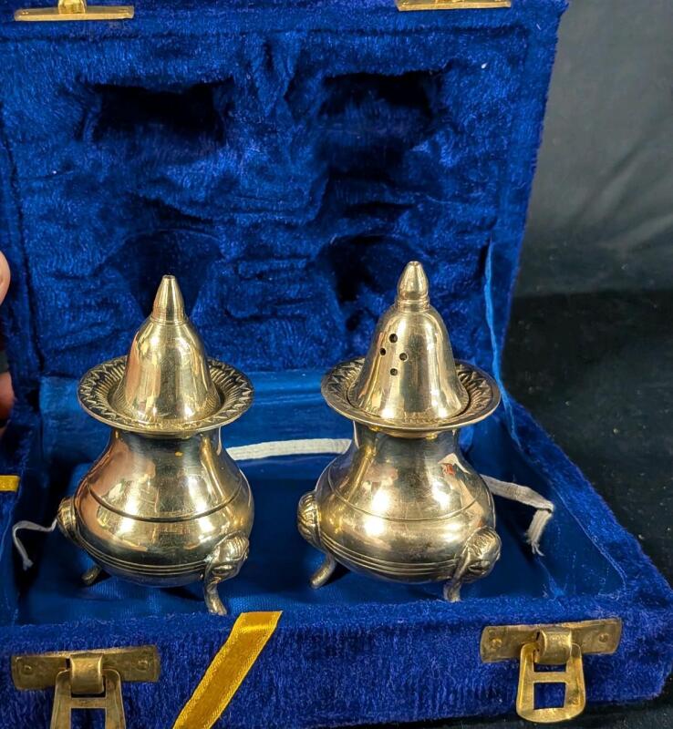 Vintage metal Salt and Pepper shakers with case.
