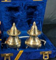 Vintage metal Salt and Pepper shakers with case.