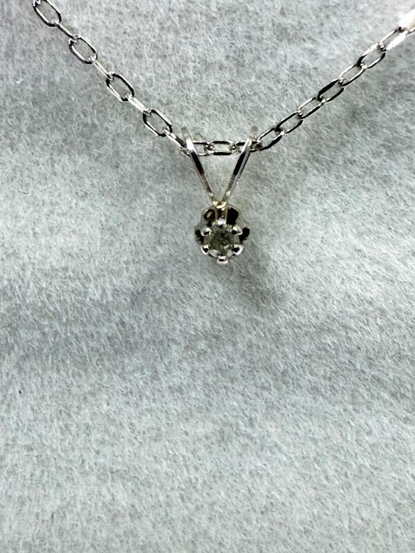 10KT White Gold Natural Diamond (0.02ct) Pendant with Sterling Silver Chain, Retail $400.00. Diamond is the birthstone for April.