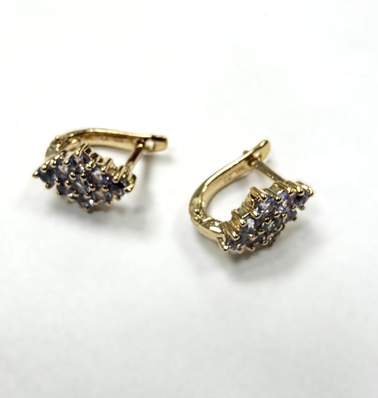 Gold Plated Sterling Silver Natural Tanzanite (1.26ct) Earrings, W/A $650.00. Tanzanite is the birthstone for December.