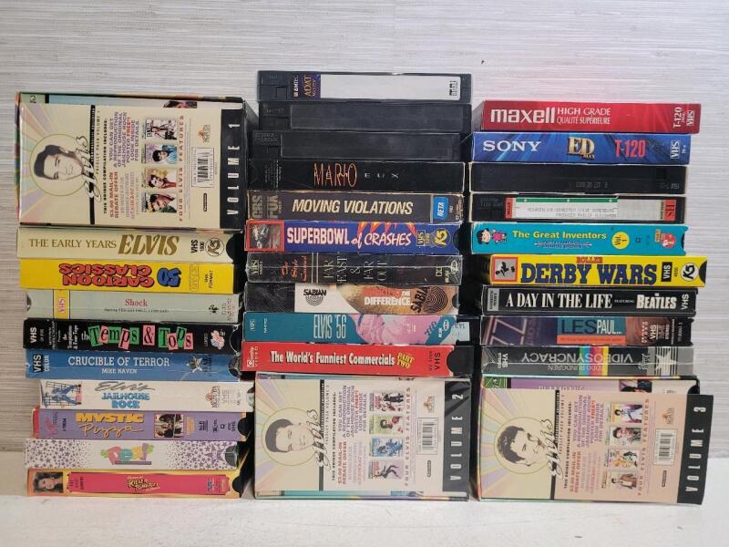 40 VHS Tapes . Elvis , Comedy , Music , Sports , Cartoons