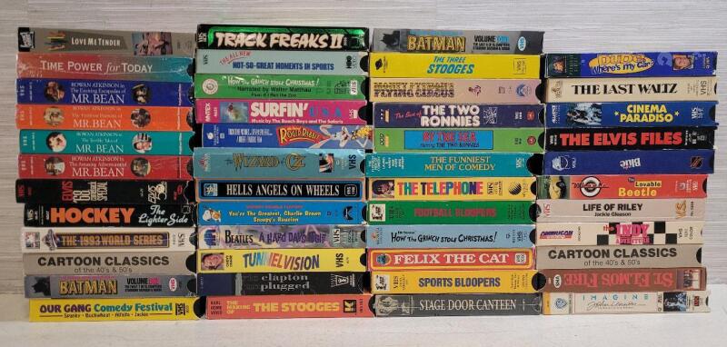 47 VHS Tapes . Comedy , Action , Music , Sports , Cartoons .