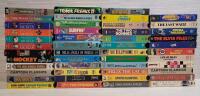 47 VHS Tapes . Comedy , Action , Music , Sports , Cartoons .