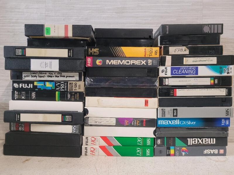 38 VHS & Betamax Tapes . Contents Unknown