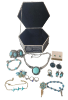 Black Glass Jewelry Box with Assorted Jewelry . Rings , Brooches , Bracelets , Necklaces .