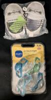 New Baby Supplies. Size 1 Shoes. And 4 Pacifiers