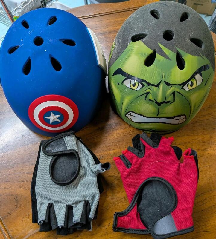 2 Childrens Size Small Helmits. And 2 pairs of Riding Gloves (No Size)
