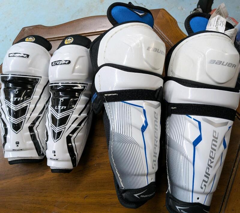 2 Pairs of Shin Guards. CCM 8" Baur 10"