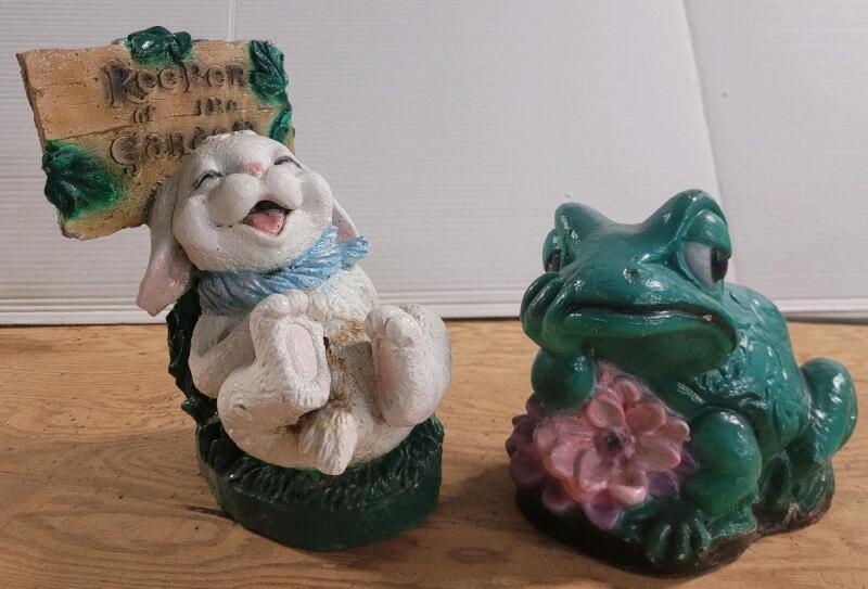 Two (2) Garden Art Cement Statues . Measures 6.5" & 9" tall
