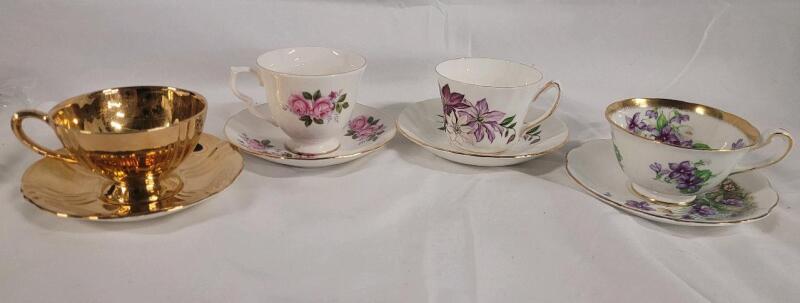 Four (4) Set Cups & Saucers , All Pieces Ring True .