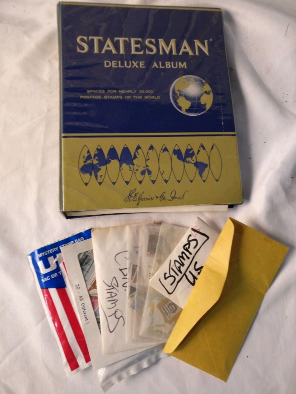 Statesman Deluxe Stamp Album with Some Stamps