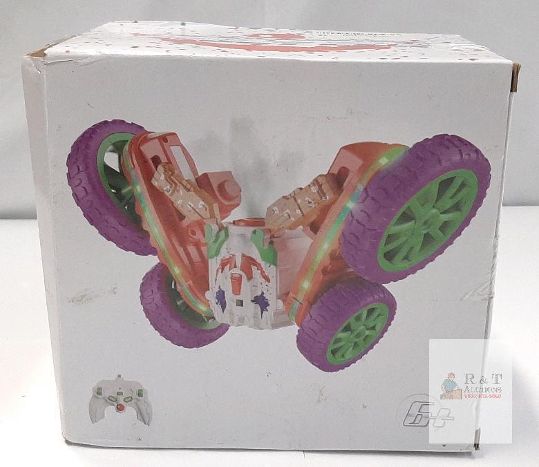 NEW RC Stunt Car HG4-47 &ndash; 2.4GHz, 360&deg; Spin, Mist Spray, Dual-Sided, Flash Lights, Orange/Purple