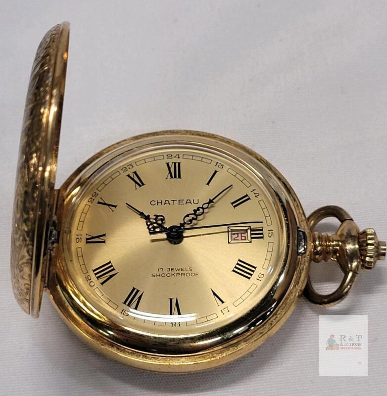 Vintage Chateau Pocket Watch featuring a Gold-Toned Hunter Case with Intricate Engraving . Requires Service