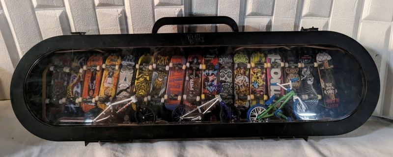 Tekdeck Case with 27 Fingerboards and 3 Finger Bikes