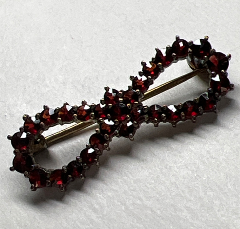 Vintage sterling Rose Cut Garnet Infinity Bow Brooch