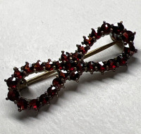 Vintage sterling Rose Cut Garnet Infinity Bow Brooch