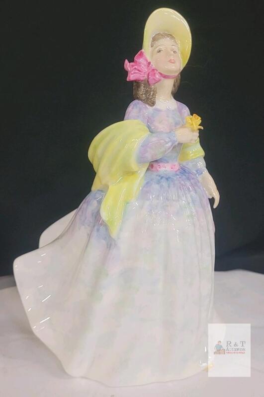 Royal Doulton " Clare " Figurine . Measures 7 &frac34;" tall . No chips or cracks