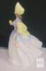 Royal Doulton " Clare " Figurine . Measures 7 &frac34;" tall . No chips or cracks - 2