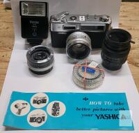 Vintage Yashica Eletro 35 SLR 35mm Camera w/45mm Lens (attached) , Fujinon 55mm Lens , Auto Tele Converter 2&times; Len & 2 Lens Adapters plus Vivitar Auto Flash