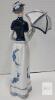 Royal Crown " Victorian Mady holding Umbrella " Porcelain Figurine . Measures 12 &frac34;" tall . No chips or cracks - 3