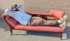 Victorian-Style Fainting Couch with Carved Hardwood Frame and Pink Damask Upholstery-23" &times; 70" &times; 29" Tall. Vintage. No strong odors. Wear throughout upholstery. Wheels roll well with dune squeaking. R&T's own Mike used to show scale. - 2